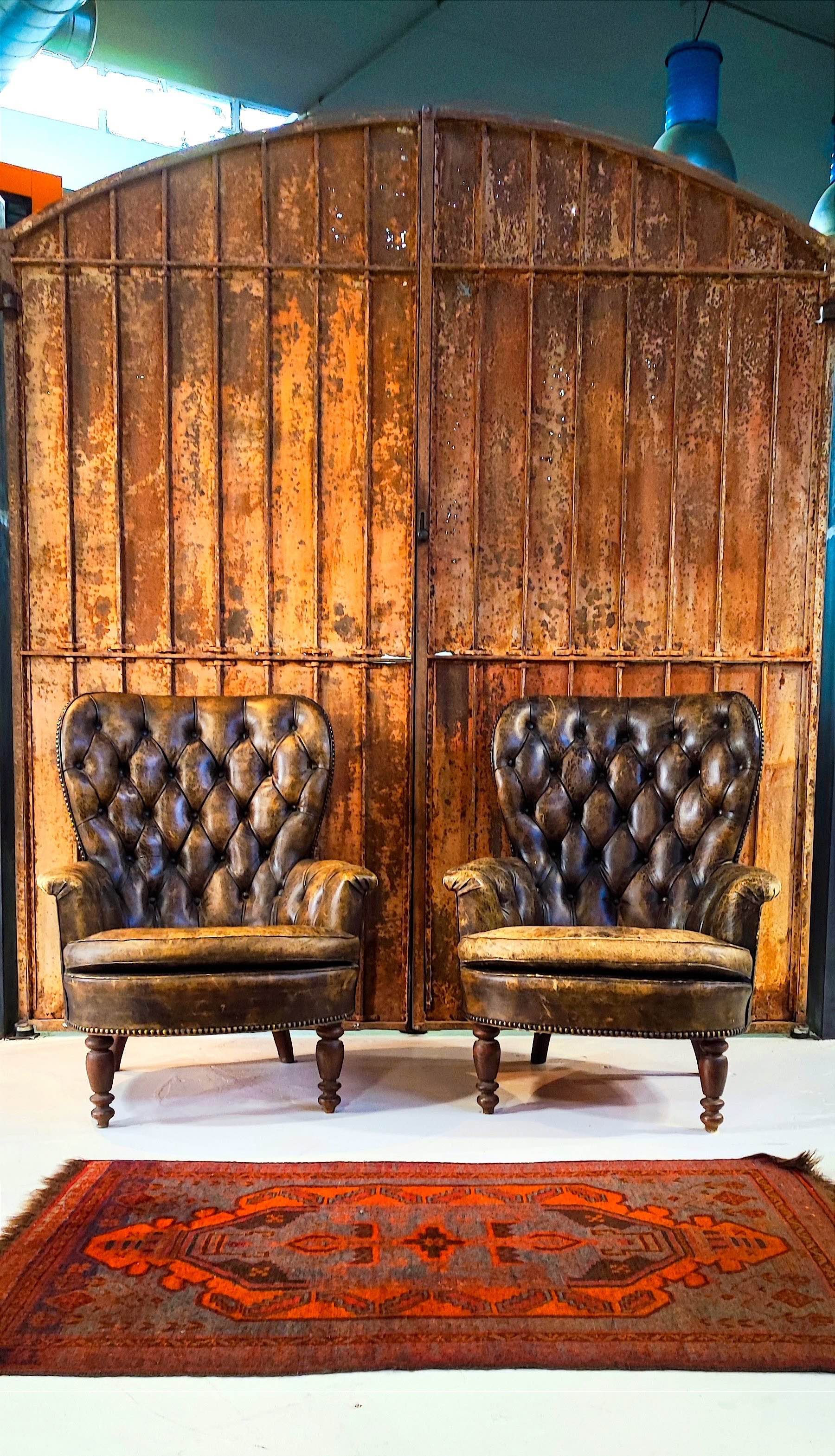 Poltroncine in pelle in stile Chippendale