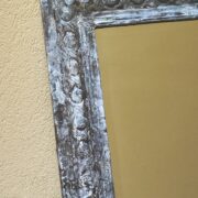 Specchio con cornice in ferro lavorato